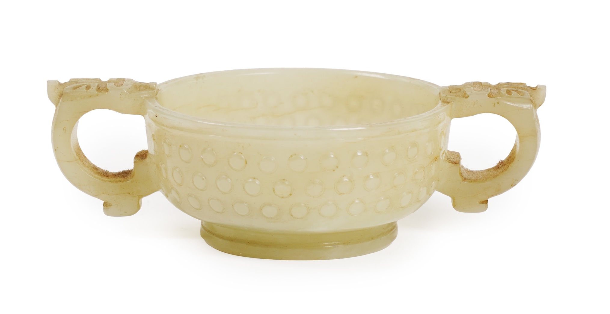 A Chinese pale celadon and russet veined jade cup, 17th century